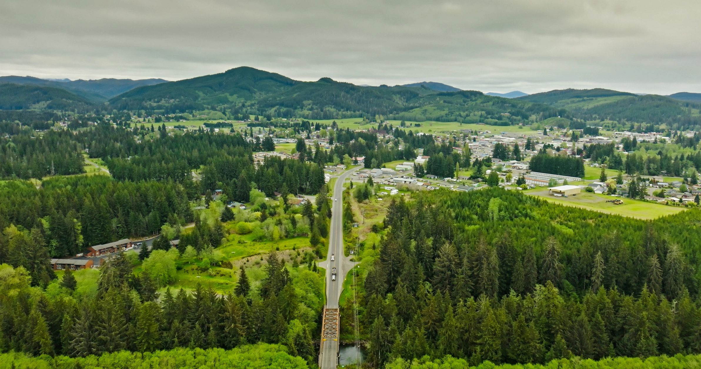 Aerial view of a Washington community surrounded by evergreen forest